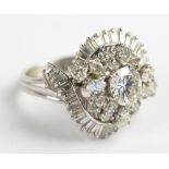 A white gold and diamond set ballerina/cluster ring,