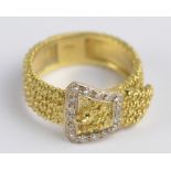 A gentleman's 18ct yellow gold textured diamond set ring in the form of a belt, ring size R 1/2,