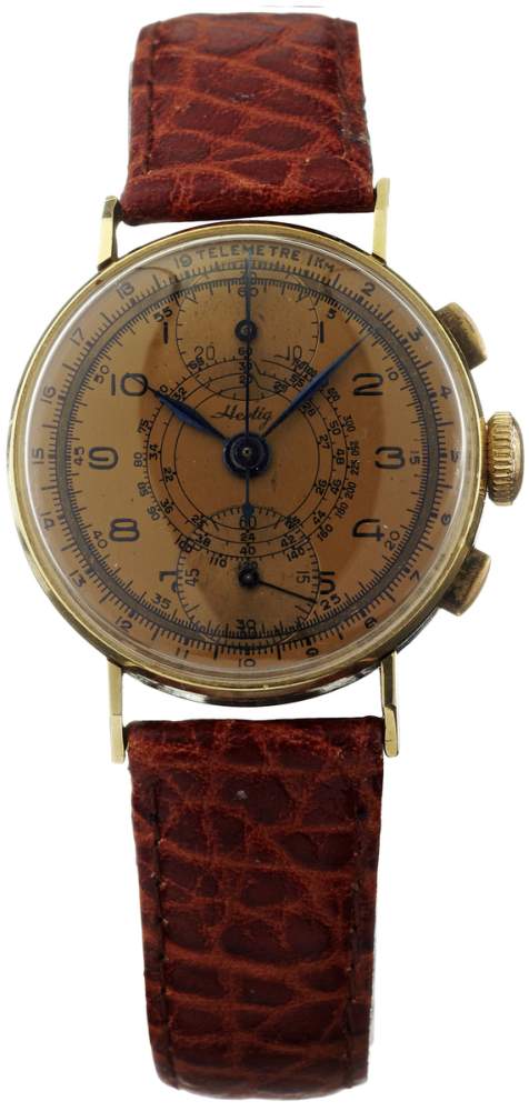 Chronograph "Hertig" Um 1950. Gehäuse aus Gelbgold 750. Boden gedrückt. Goldfarbenes Zifferblatt mit