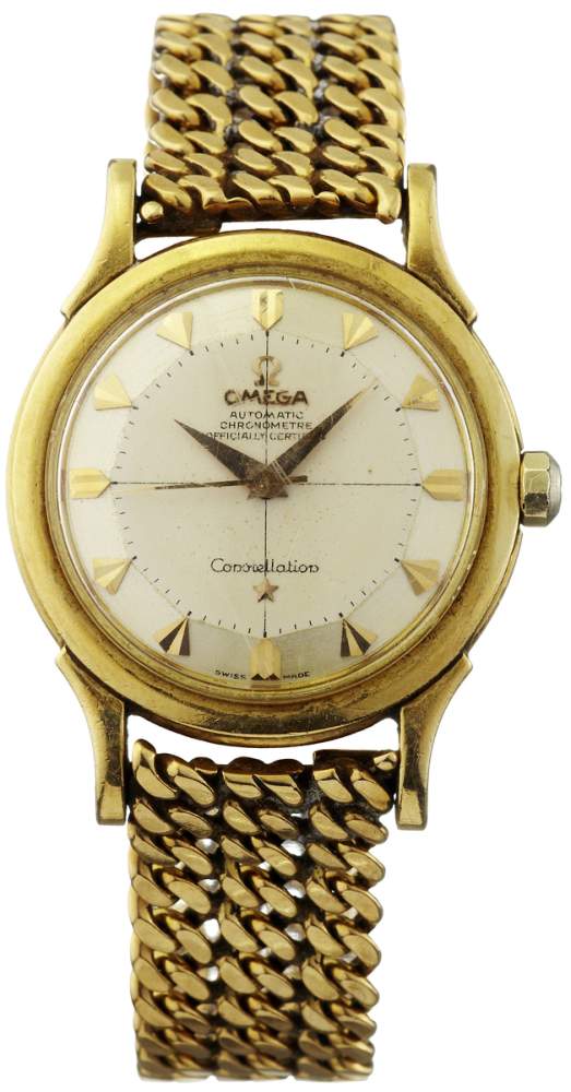 Armbanduhr "Omega" Um 1955. "Omega Constellation". Gehäuse und Gliederarmband aus Gelbgold 750.