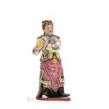 Dignatario Figura en porcelana China. Trabajo Chino, Primera mitad del siglo XX. El rostro y las