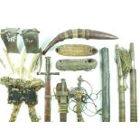 An interesting collection of tribal arms and armour, to include two Sudanese Kaskara, a Sudanese