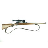 A deactivated Mauser bolt action sporting rifle and scope, 23inch sighted barrel fitted with a
