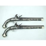 A fine pair of silver wire inlaid flintlock duelling or holster pistols by William Perry, 11inch