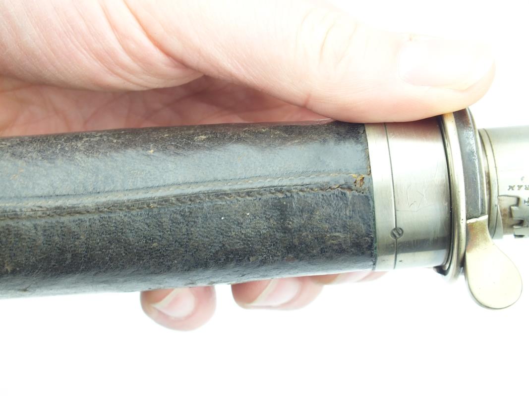 A Snider powder flask for a rifle, the leather covered body with white metal top, stamped EXTRA - Image 6 of 9