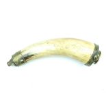 A Baker Rifle powder horn, the polished natural form body with brass mounts, the base with