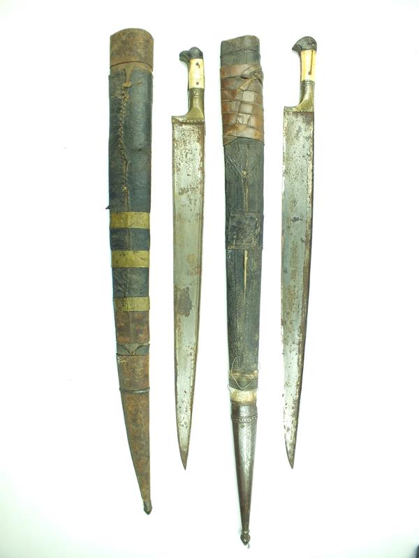 A brace of large 19th Century Khyber knives, the first with 57.5cm T-section blade, characteristic