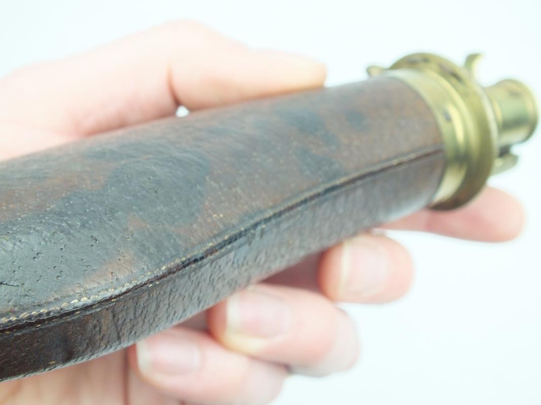 A Sykes Patent pivoting top powder flask for a rifle, the brown pig-skin covered body (worn) with - Image 5 of 9