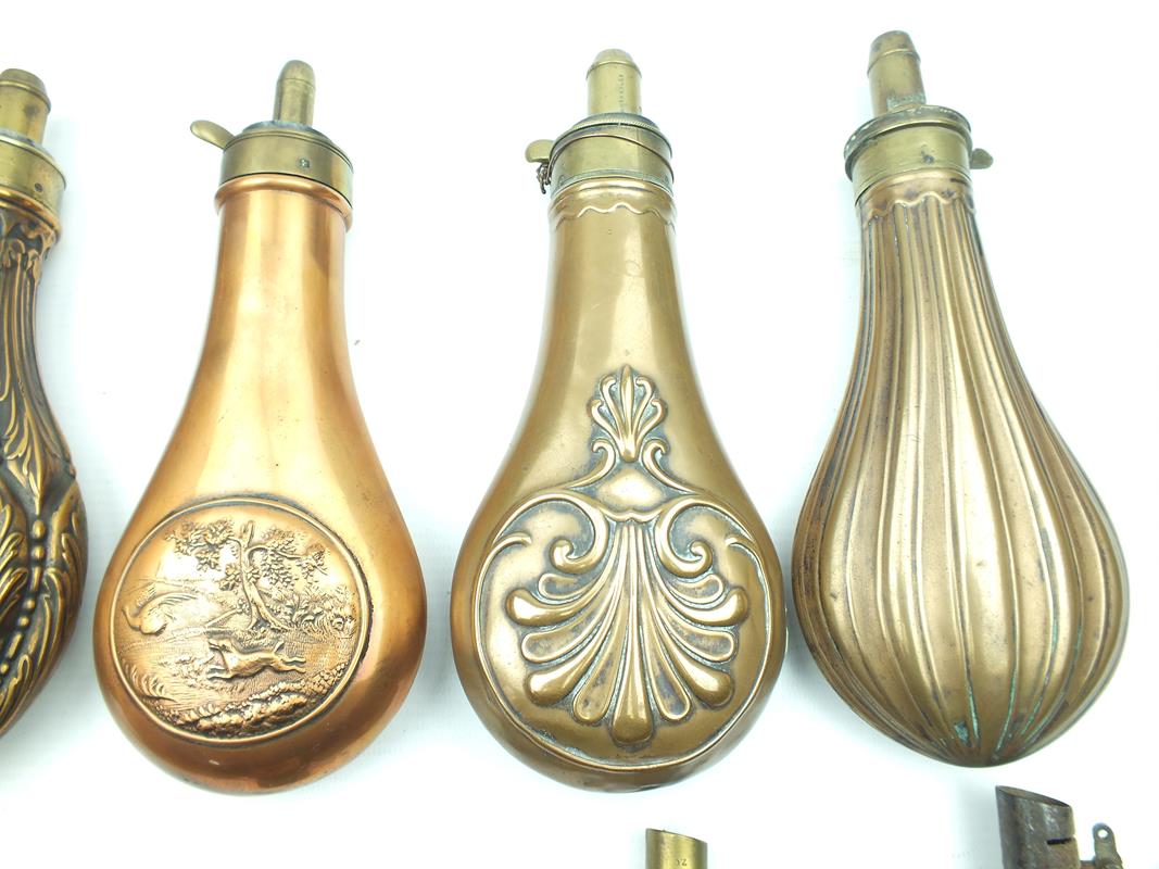 A Dixon & Sons embossed copper powder flask, decorated over all with Acanthus leaves, together - Image 3 of 9
