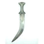 A Silver damascene hilted Jambiya, 30.5cm sharply curved blade with raised medial ridge, the forte