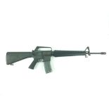 A deactivated COLT M16 A1 rifle, 55cm sighted barrel stamped with the serial no. 9490013, two-