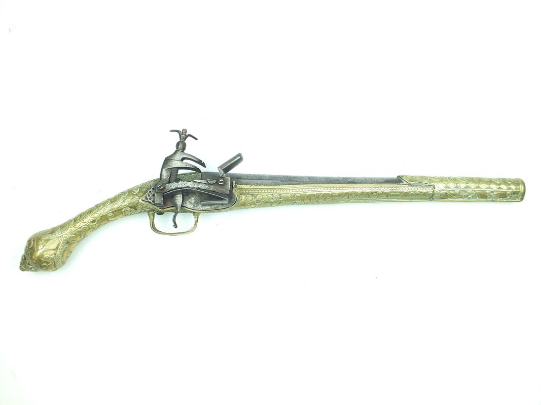 A brass mounted Balkan miquelet lock holster pistol, 12.5inch slightly swamped barrel, plain lock,