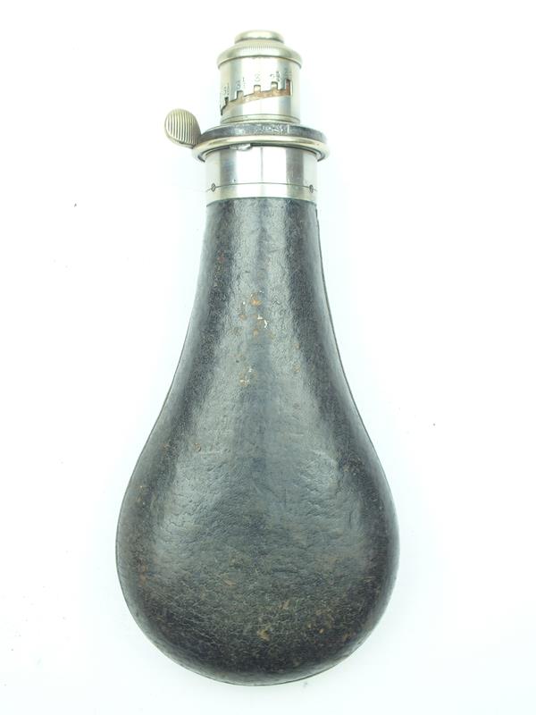 A Snider powder flask for a rifle, the leather covered body with white metal top, stamped EXTRA