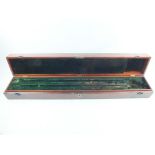 A brass mounted mahogany presentation sword case, the lid with flush fitting handle, close fitted