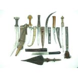 A small collection of Tribal edged weapons, to include examples from North Africa, seven with