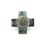 An Imperial Russian Uglich Infantry Regiment Officer's badge, being a black enamelled cross with