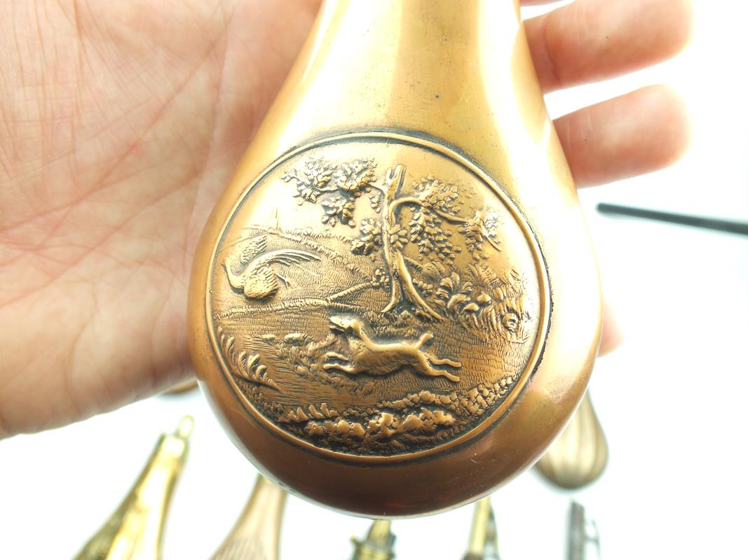 A Dixon & Sons embossed copper powder flask, decorated over all with Acanthus leaves, together - Image 9 of 9