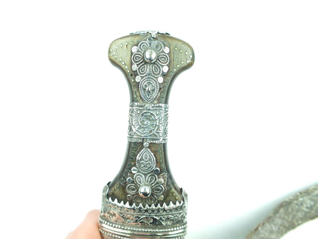 A white metal mounted Arab Jambiya, 18cm sharply curved blade with raised medial ridge, - Image 7 of 9