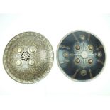 A brace of Indian shields, the first 39cm in diameter and decorated with four brass bosses and