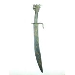 A Chinese bronze sword, 38cm scimitar form blade with clipped back point, crudely decorated with a