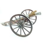 A good 20th Century model of a field cannon, 15inch part bored barrel with plain trunnions and