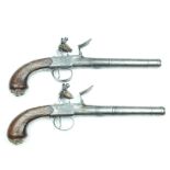 A brace of 25-bore silver mounted flintlock boxlock Queen Anne cannon barrelled pistols, 5.75 inch