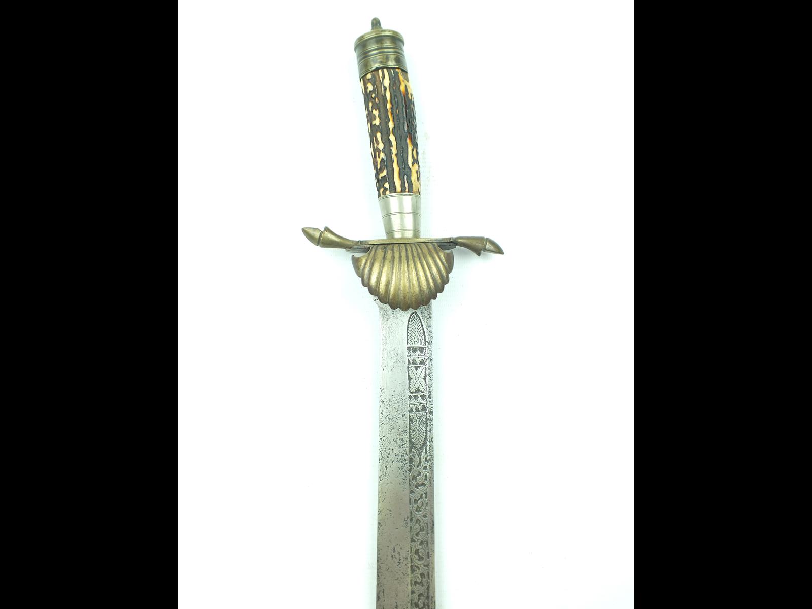 A 19th Century Dutch East Indies Hunting Hanger with Klewang Blade, 57.5cm blade decorated with