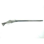 A 16th/17th Century wheellock pistol or carbine, 24.75inch tapering two-stage barrel, octagonal at