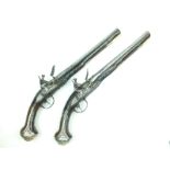 A fine pair of 18-bore silver mounted Russian flintlock holster pistols, 12.5inch swamped barrels,