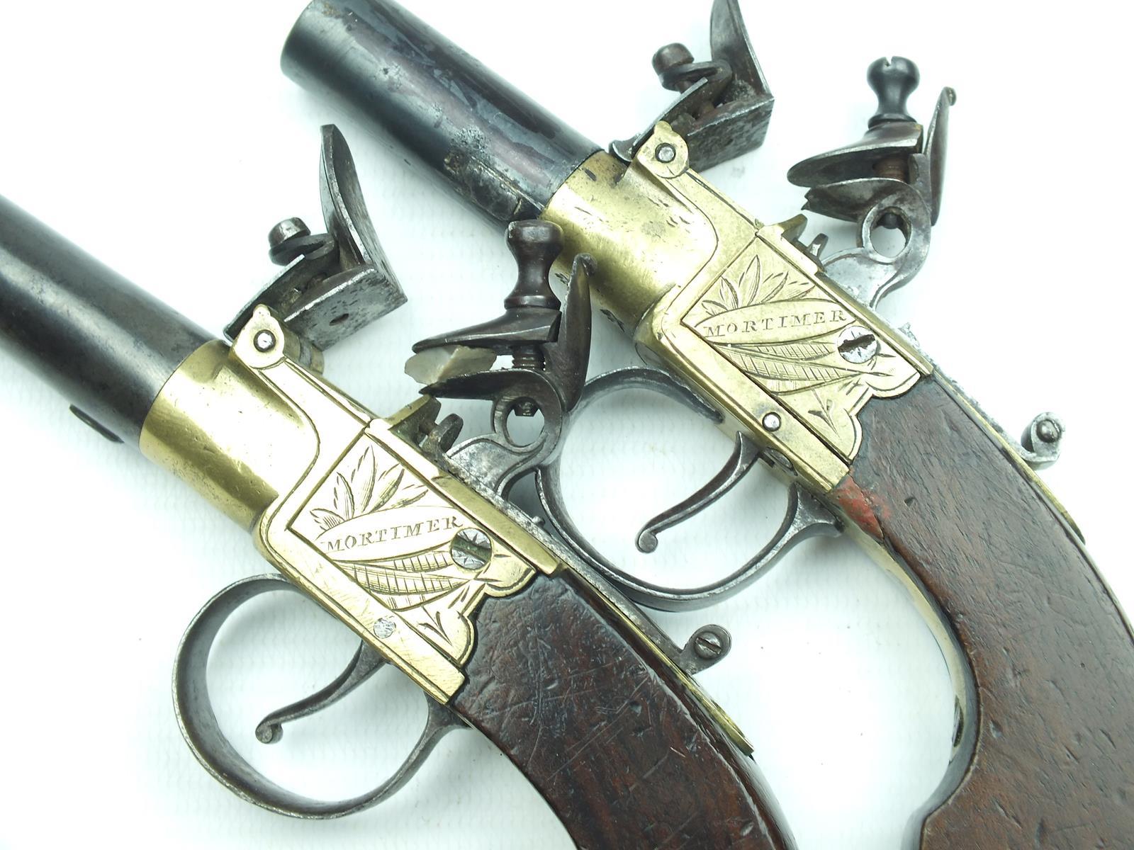 A pair of flintlock boxlock pocket pistols signed Mortimer, 1.75inch turn-off barrels, border - Image 3 of 10