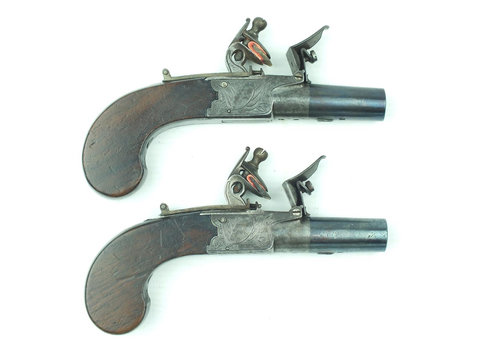 A pair of 54-bore flintlock boxlock pocket pistols, 1.5inch turn-off blued barrels, border