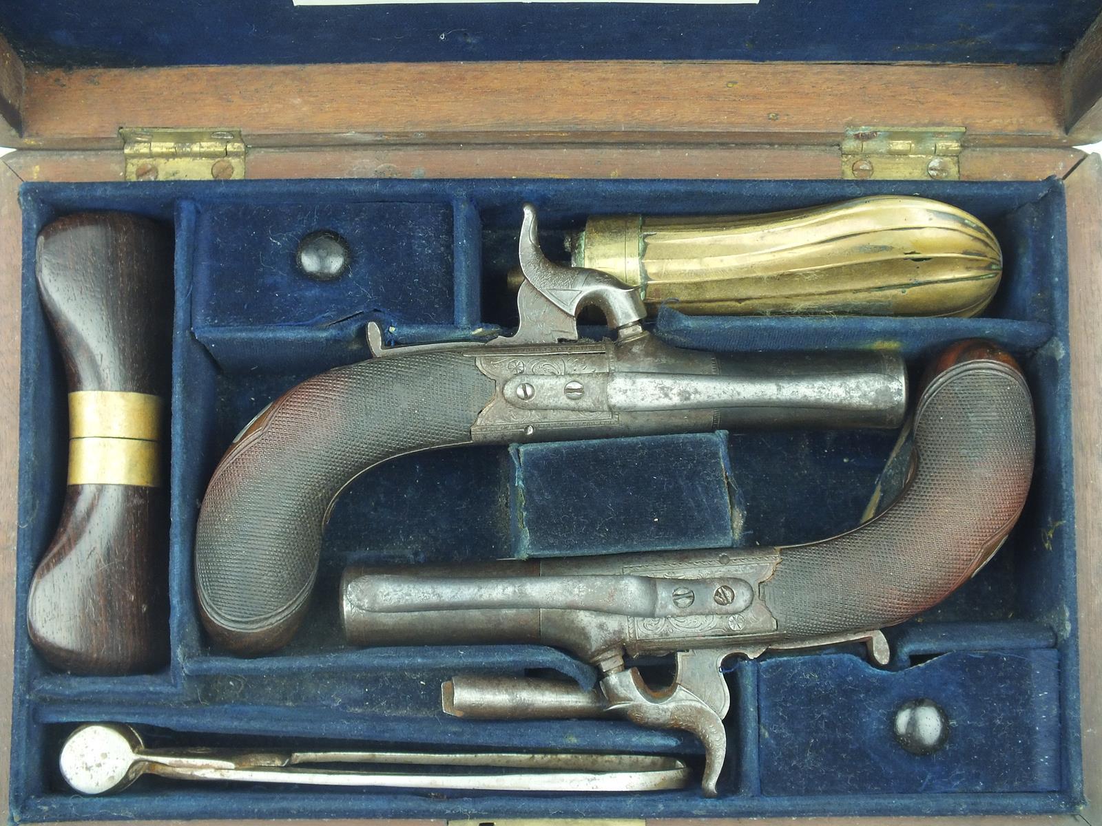 An interesting cased pair of 80-bore percussion belt pistols by Williams, 4cm turn-off barrels