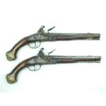 A Pair of 40-bore Bohemian flintlock holster pistols in the manner of Becker, each with 10inch