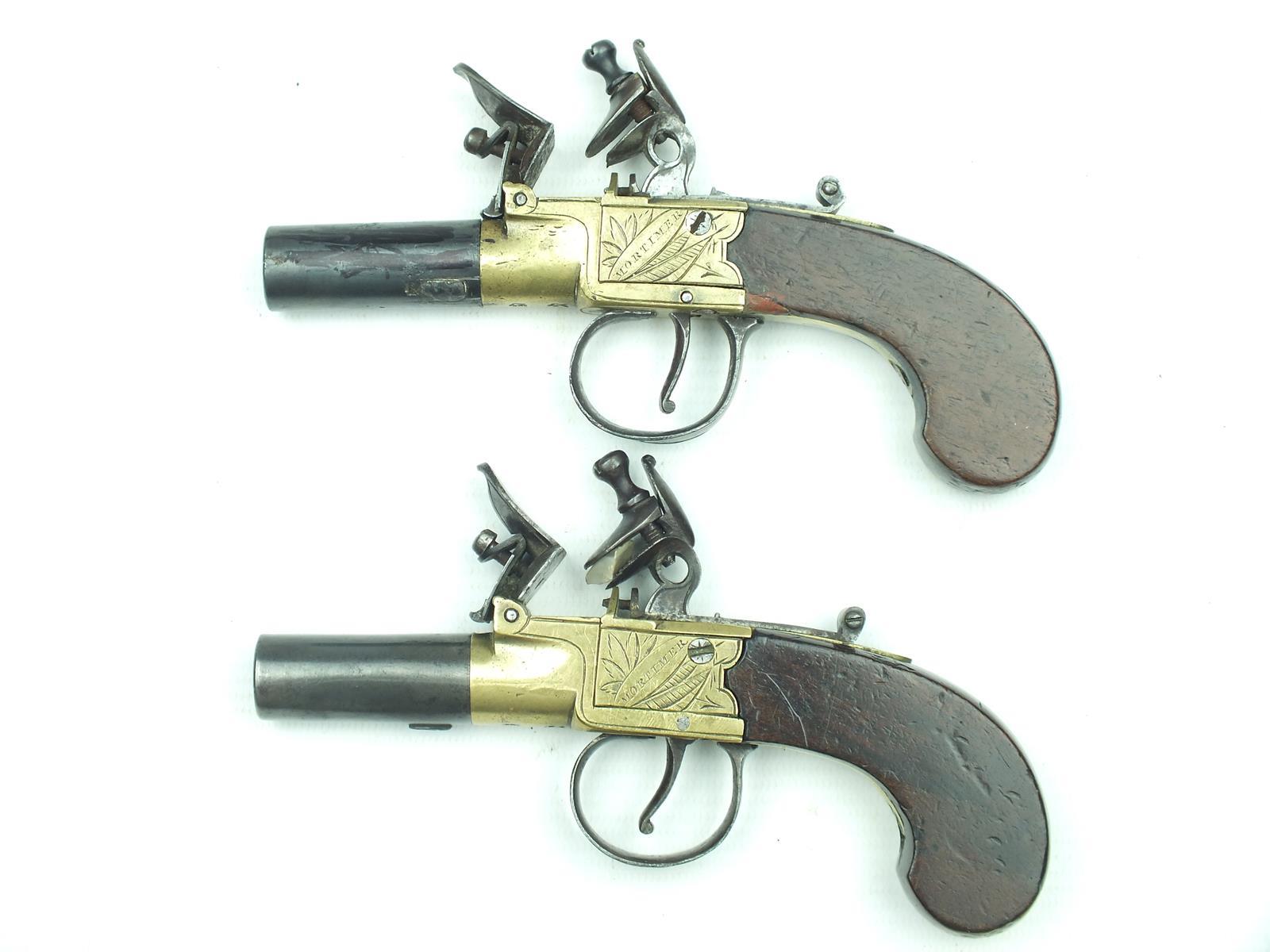 A pair of flintlock boxlock pocket pistols signed Mortimer, 1.75inch turn-off barrels, border - Image 2 of 10