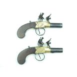 A pair of flintlock boxlock pocket pistols signed Mortimer, 1.75inch turn-off barrels, border