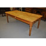 Late Edwardian pine kitchen farmhouse table with fitted drawer on turned supports