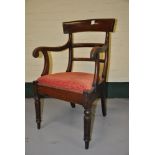 Victorian mahogany scroll armchair with red fabric upholstered drop-in seat