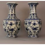 Pair of Chinese octagonal baluster form porcelain vases, shaped and bowed form with blue painted