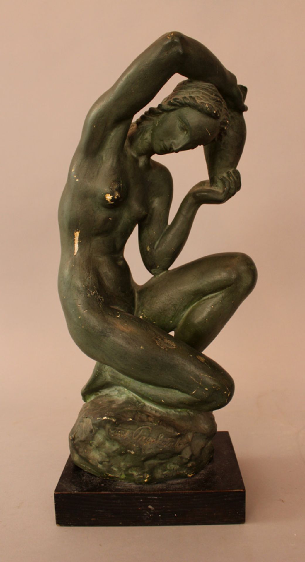 Antonín Procházka (1882–1945), Plaster figure of a naked woman holding a vase, on naturalistic base;