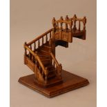 Wooden modell of a staircase with three sections and 15 steps; the gallery with turned