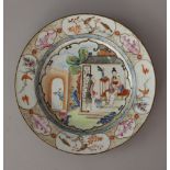 Chinese porcelain dish in Quianlong Style with painted family house scene in the centre and rich