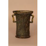 Vessel in Gothic manner, bronze cast with figures and ornaments in half relief; two handgrips,