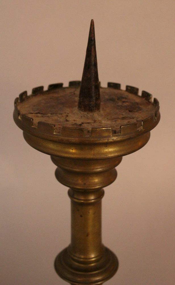 Bronze candle stick in medieval style, turned form on two lion feet with canted border and iron - Image 3 of 3