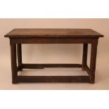 English gothic small oak table, on four legs, with connection panels on the bottom, canted legs,