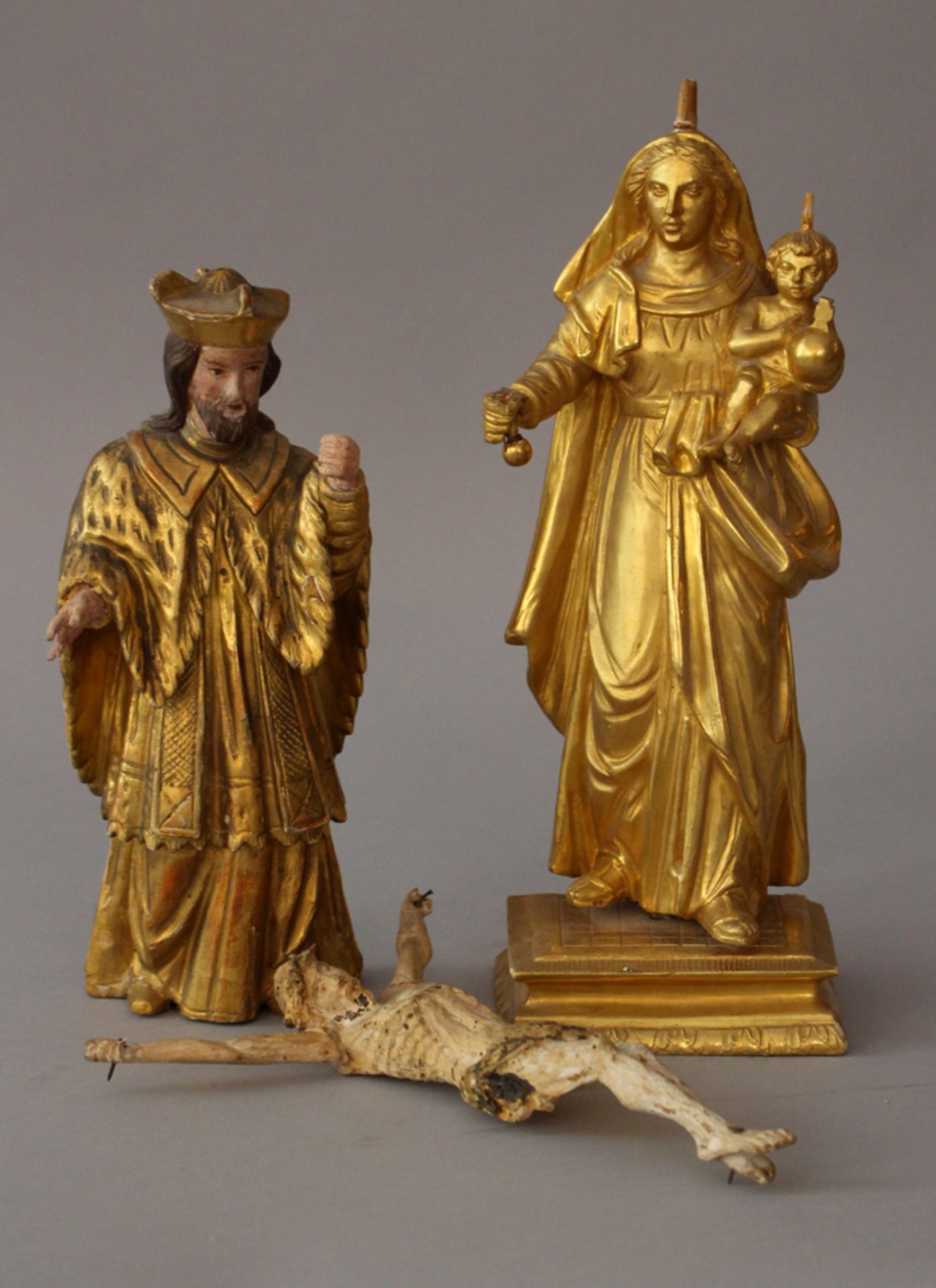 Lot of three baroque sculptures containting a wood carved Maria with Jesus on rectangular base,