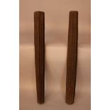 Two gothic wooden pilasters, round stepped and fluted shape with waved ornaments and bowls,