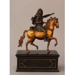 Equestrian bronze sculpture of Louis XIV on horse; bronze cast, hand finished, with original green