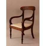 French buro armchair, on two turned feet with leaves carvings and two shaped feet on the reverse;