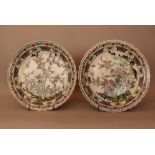 Pair of Chinese porcelain dishes, painted with birds and blossom tress, the sides richly deocrated