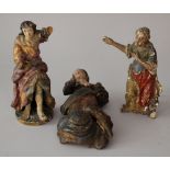 Lot of three baroque sculptures containing three female kneeling and standing wooden carved figures,